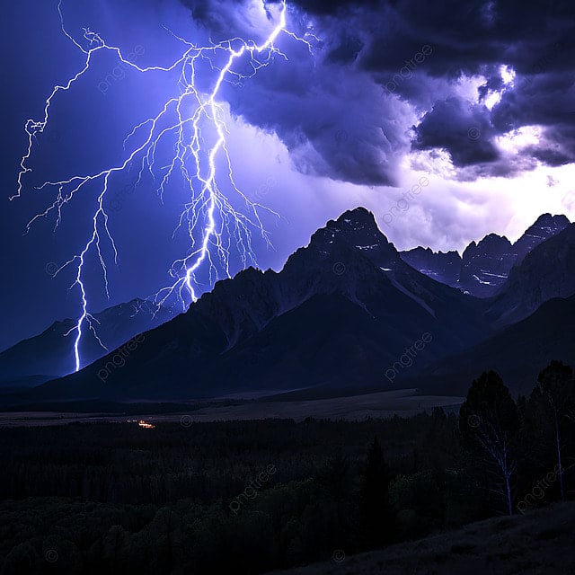 A dramatic shot of a lightning storm striking a mountain peak at night.
